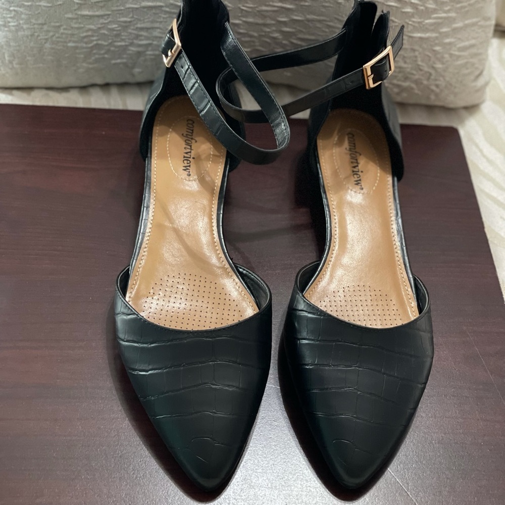 Black pointed flats with ankle strap